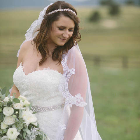 bridal portrait, white and green wedding colors, bride in field, spruce mountain ranch wedding planner, colorado wedding planning, mountain wedding inspiration