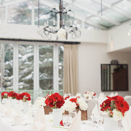 Reception venue, winter reception decor, table settings, sonnenalp wedding, vail wedding planner, colorado wedding inspiration, sweetly paired wedding planning, red floral centerpiece in wooden box, mountain wedding inspiration
