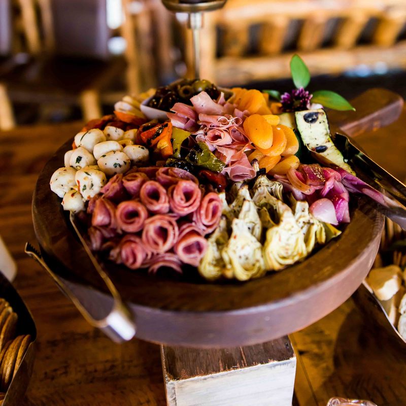 appetizer plate, wooden charcuterie board, mountain wedding planning, spruce mountain wedding, cocktail hour details, rustic barn, colorado wedding planner, mountain wedding inspiration