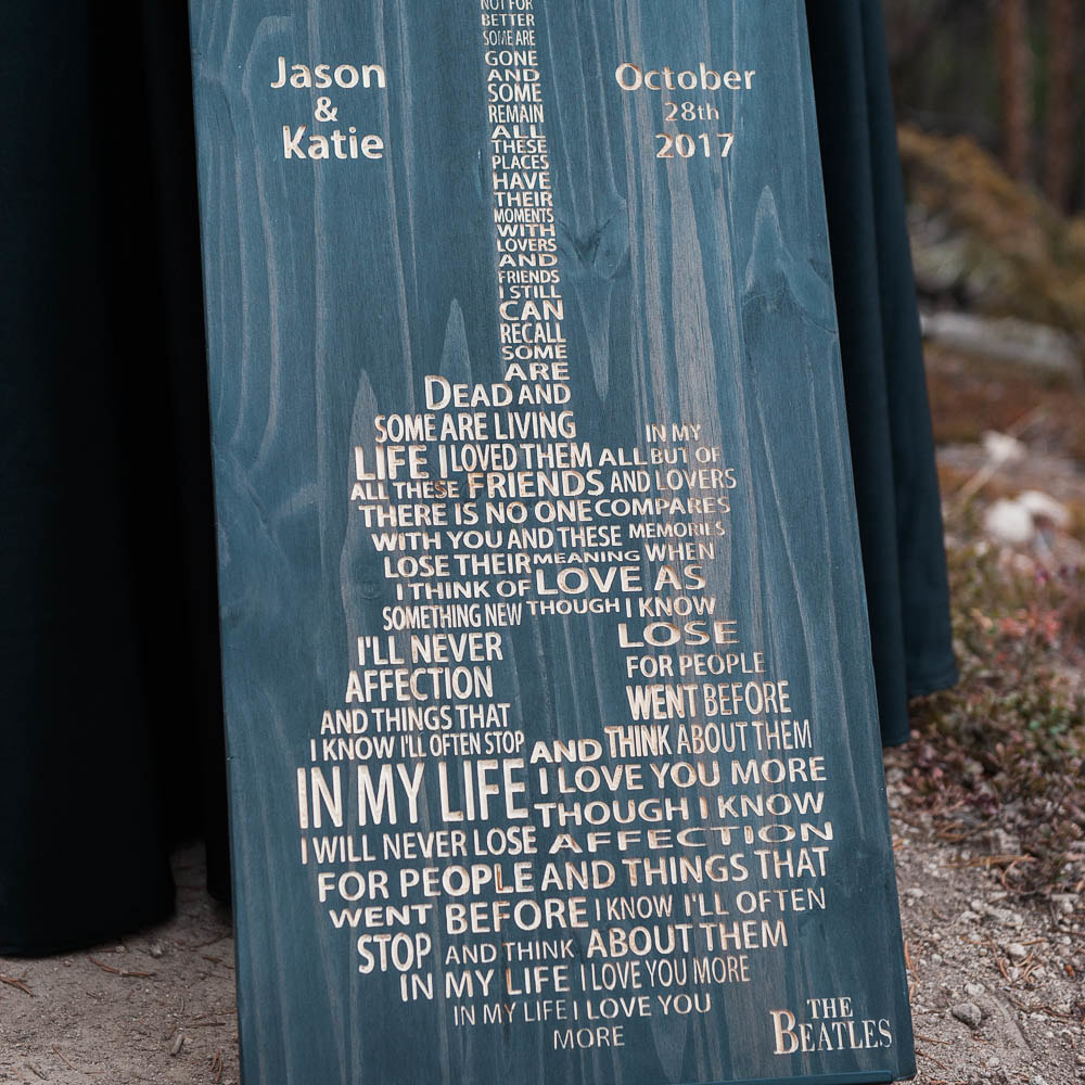 beatles inspired guitar sign, Sapphire Point destination elopement, detail photos, ceremony details, breckenridge wedding, mountain wedding planner, colorado wedding inspiration, sweetly paired elopement planning, winter wedding inspiration