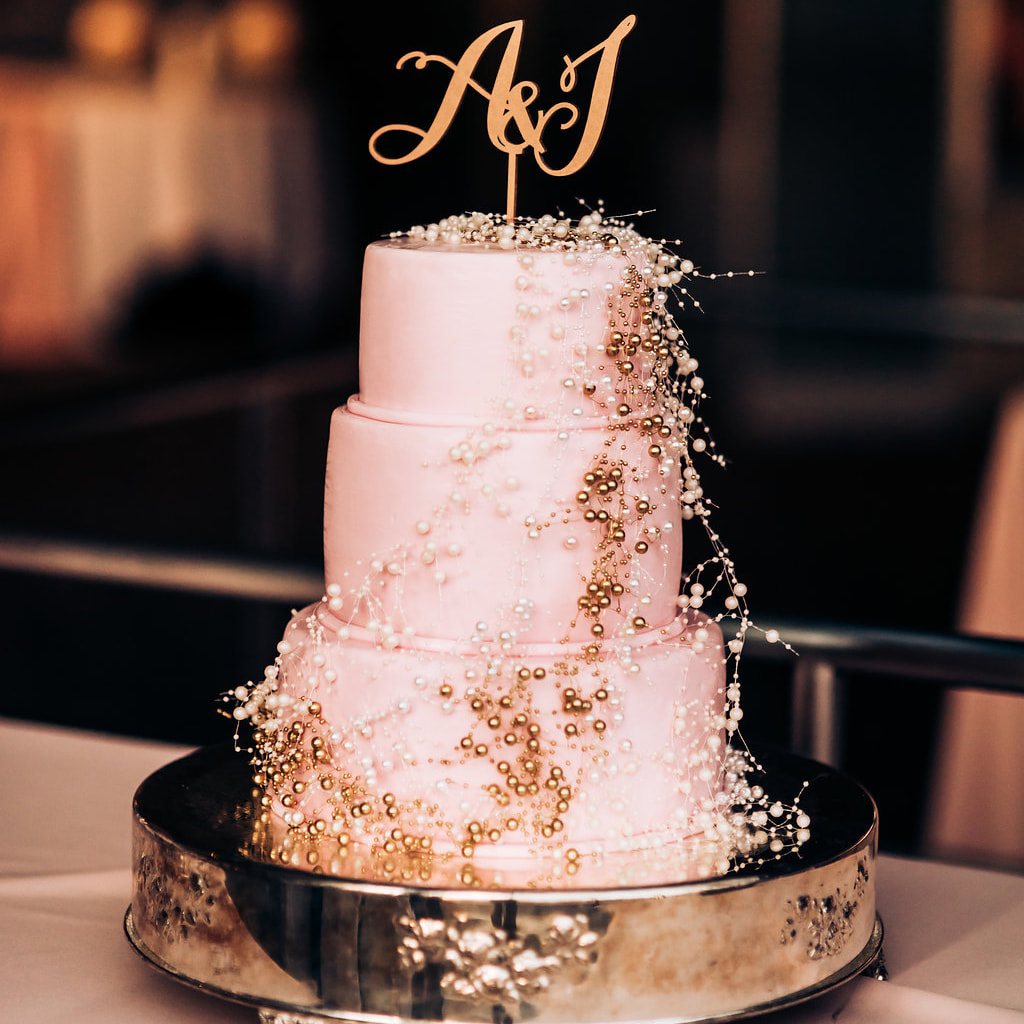 pink and gold cake, monogram cake topper, gold cake display, detail photos, reception details, denver wedding planner, colorado wedding inspiration, denver museum of nature and science weddings, sweetly paired wedding planning