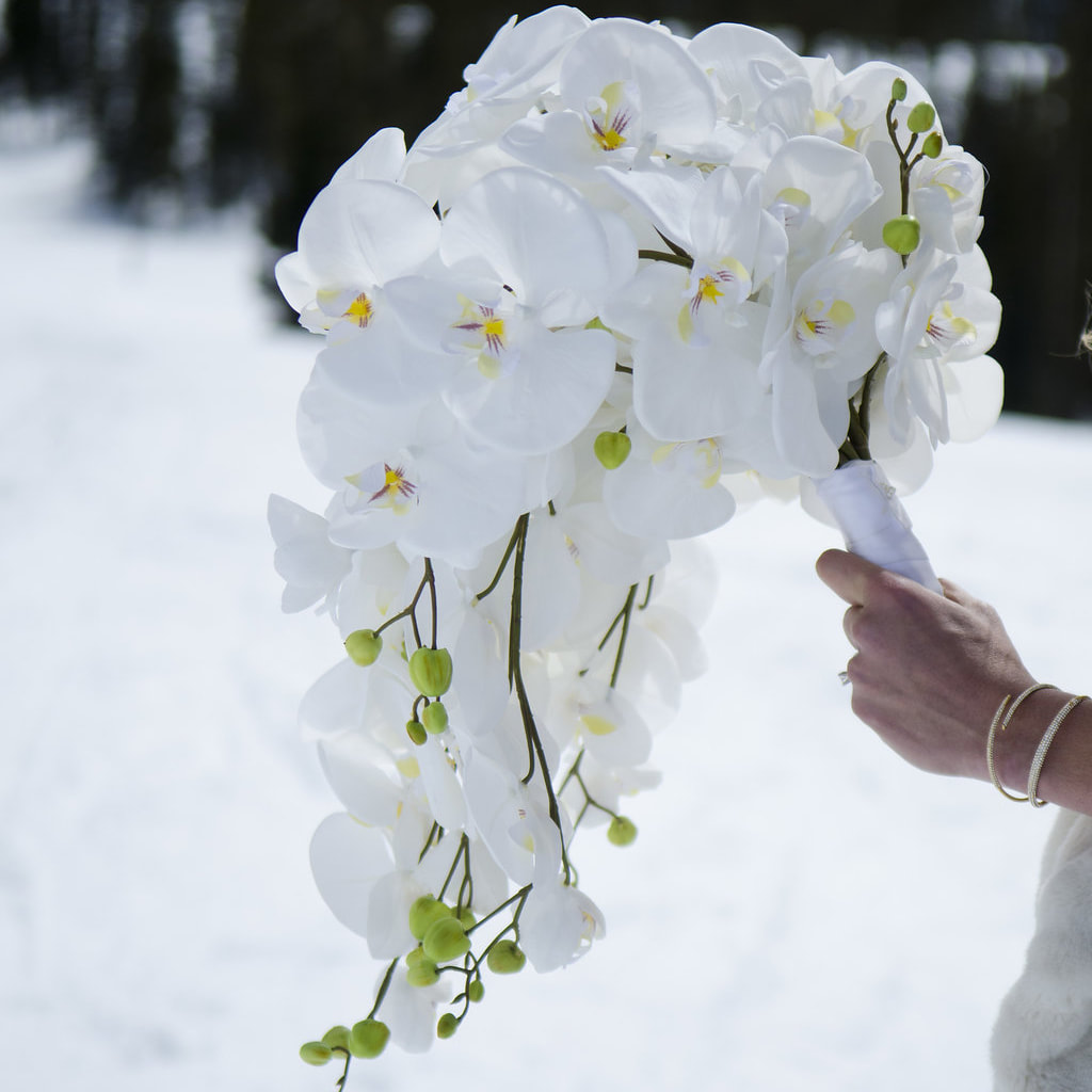 Bridal bouquet, detail photos, wedding day, winter park resort wedding planner, sweetly paired weddings, winter wedding inspiration, white orchids, silk flower bouquet