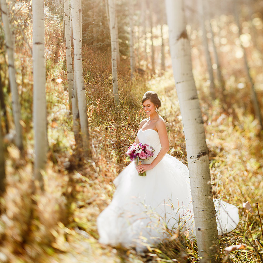bridal portrait in aspen leaves, autumn mountain wedding inspiration, vail wedding planning, colorado wedding planner, sweetly paired weddings