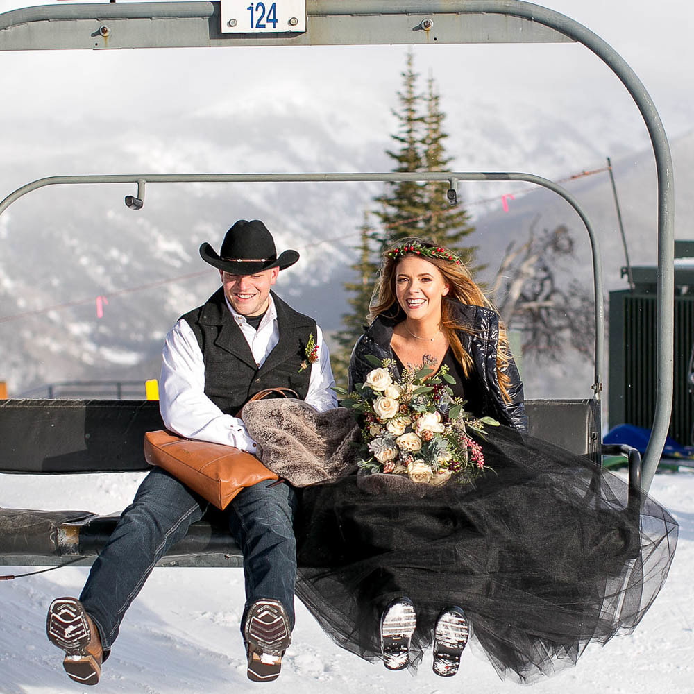 bride and groom on chair lift, Winter park elopement wedding venue, best colorado wedding planner, mountain wedding planner, winter wedding inspiration, sweetly paired weddings