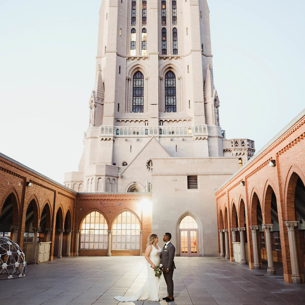 couples portrait, bride and groom at the riverside church nyc, new york city wedding planning, destination wedding planner, sweetly paired weddings, autumn wedding inspiration