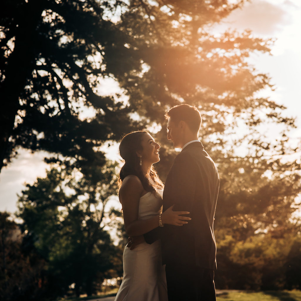 Bride and groom portrait in city park at sunset among the trees, denver wedding planner, colorado wedding planner, classy formal real weddings, sweetly paired