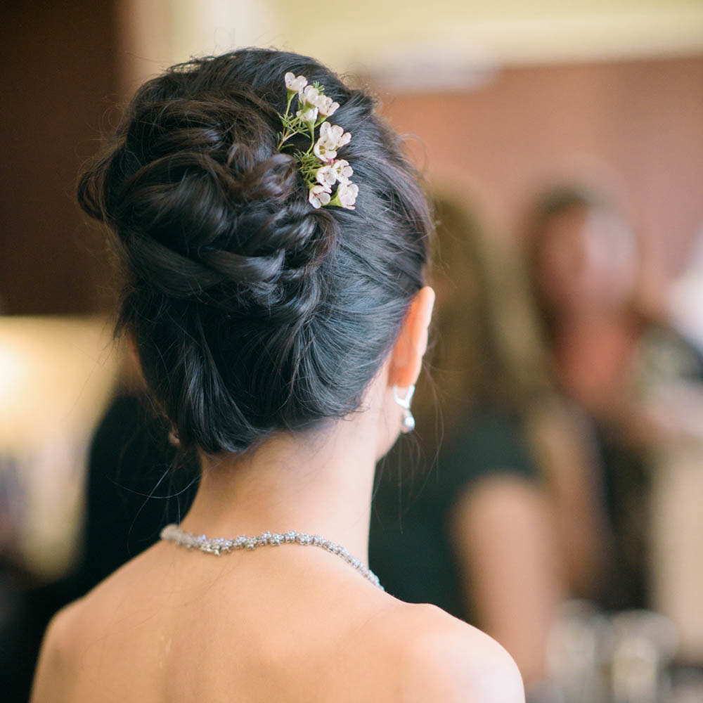 Bride getting ready photo, bridal updo hairstyle with flowers, detail photos, boulder st. julien hotel wedding planner, colorado wedding planner