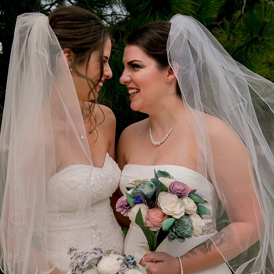 bridal portrait, bride and bride lgbt couple, wooden bridal bouquets, intimate moment, spruce mountain ranch wedding planner, colorado real weddings, mountain wedding planner, sweetly paired