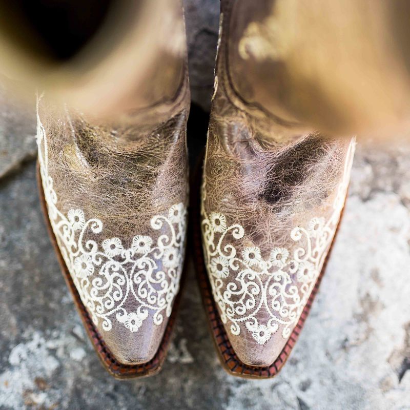 cowboy boots, bride getting ready details, embroidered cowgirl boots for wedding, spruce mountain ranch wedding planner, rustic barn wedding, colorado wedding inspiration