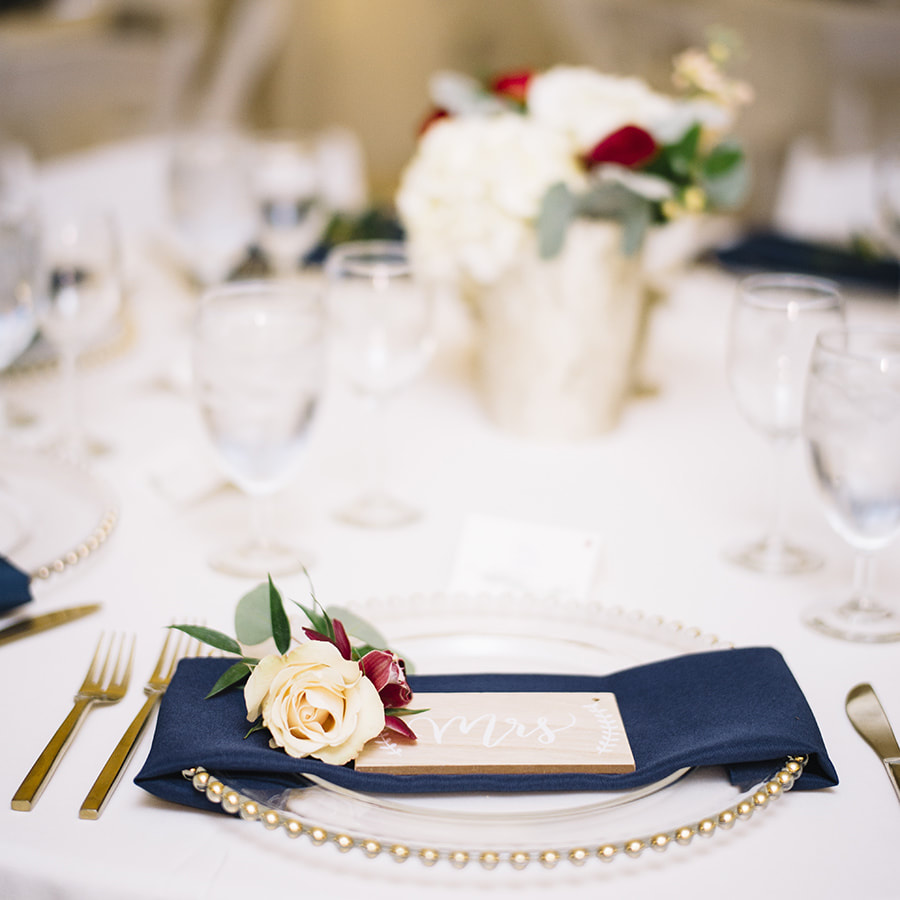 reception details, cherokee ranch, navy and gold, tented reception space, mountain wedding inspiration, blue waterfall napkins, barn reception space, mountain wedding inspiration, sweetly paired wedding planner