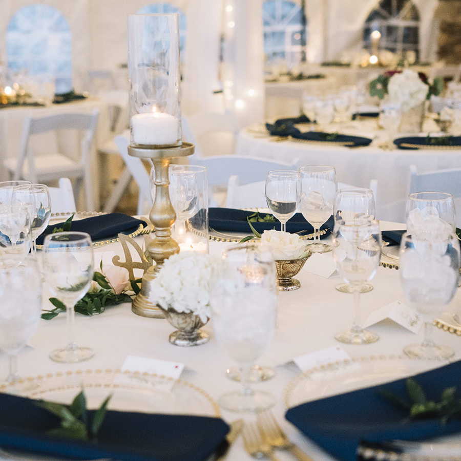 wedding reception details, candles, navy and gold wedding colors, tented reception space, colorado mountain weddings, cherokee ranch wedding inspiration, sweetly paired wedding planner