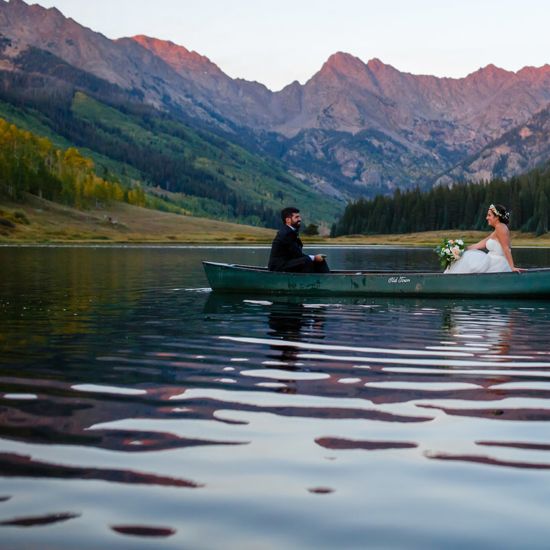 piney river ranch wedding planner, mountain lakeside wedding venue, outdoor ceremony with a view, scenic wedding locations colorado, mountain wedding inspiration, bride and groom in canoe