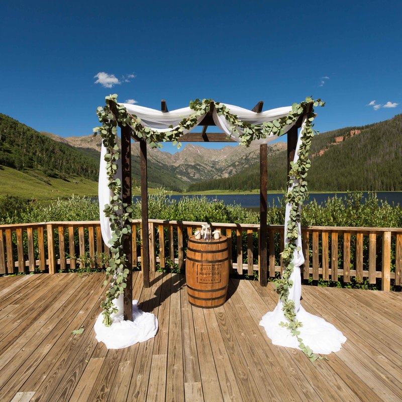 wedding mountain inspiration, beaver creek wedding planner, vail wedding planning, sweetly paired weddings, ceremony site with chuppah, wine barrel table, lakeside outdoor ceremony