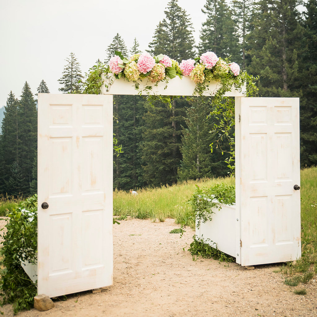 beaver creek wedding planner, colorado wedding, mountain wedding burgundy wedding flowers, luxury wedding colorado, rental aisle doors
