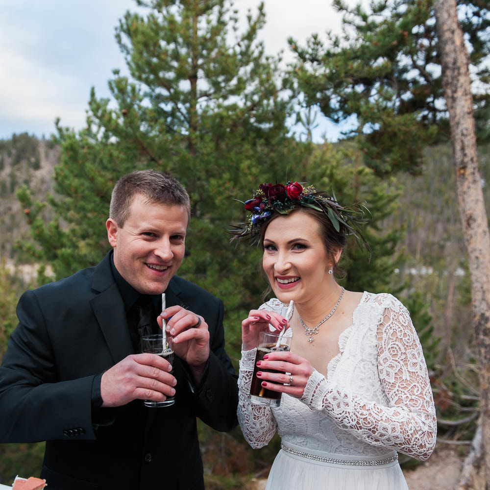 bride and groom rum and coke toast, sapphire point elopement, winter wedding inspiration, sweetly paired, best colorado destination wedding planner