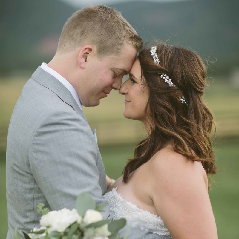 bride and groom portrait, foreheads touching, romantic pose, spruce mountain ranch weddings, colorado wedding inspiration, mountain wedding planners