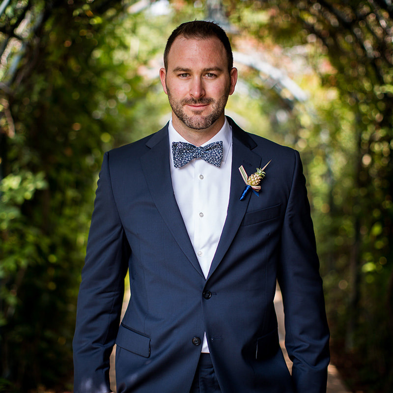 groom portrait formal, navy tux and bow tie, gold pineapple boutonniere, colorado wedding planning, mountain wedding inspiration, sweetly paired wedding planner