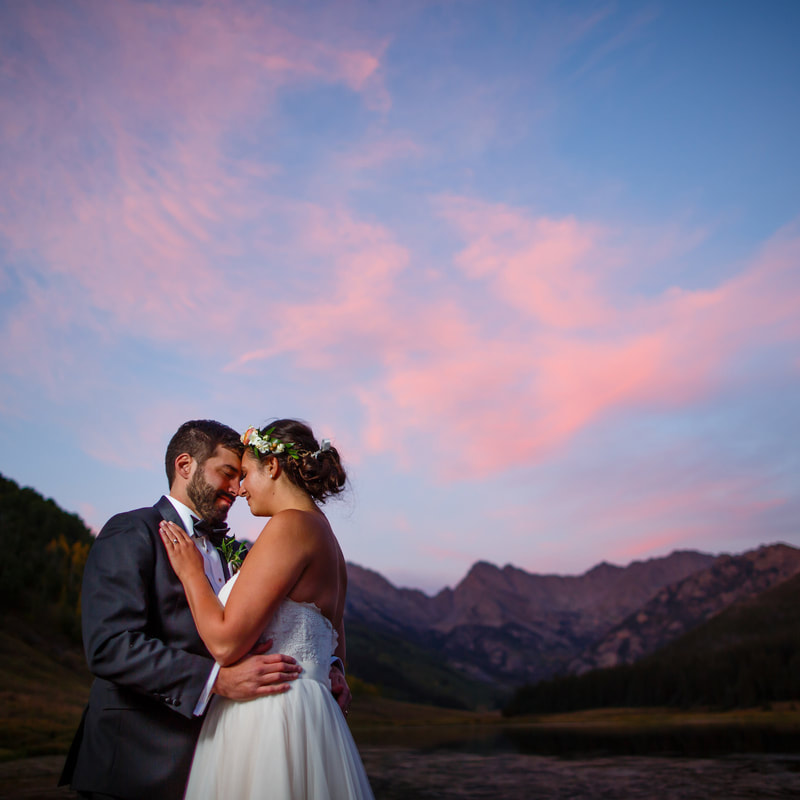 bride and groom outside during sunset at piney river ranch, glamping wedding, mountain wedding inspiration, vail wedding planners, sweetly paired weddings, intimate couples portrait, foreheads together