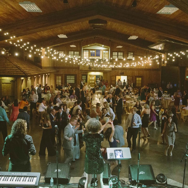 wash park band playing on stage at spruce mountain ranch, upper ranch reception space, colorado wedding inspiration, mountain wedding planner, sweetly paired weddings