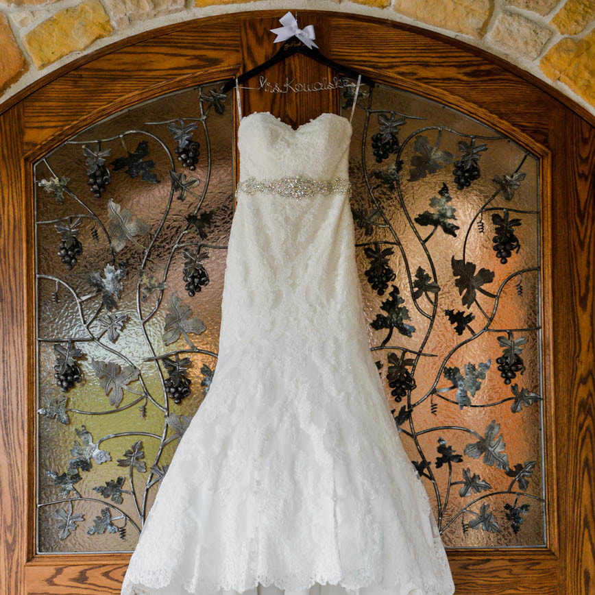 Bride getting ready photo, dress hanging on doors, detail photos, denver wedding planner, colorado wedding planner