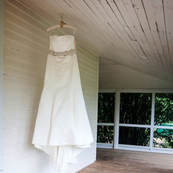Bride getting ready photo, detail photos, botanic gardens wedding planner, colorado wedding planner, sweetly paired, dress hanging outside barn