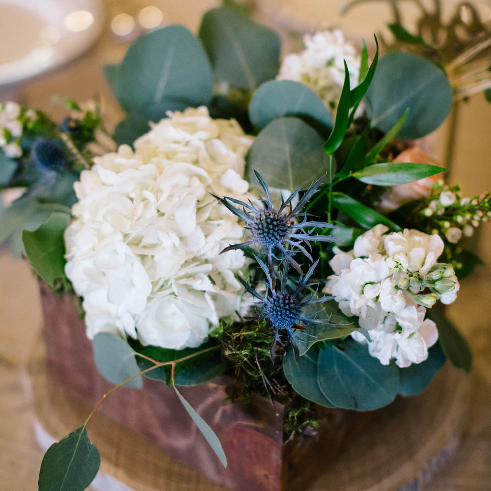 floral Centerpieces in wood boxes, reception detail photos at spruce mountain ranch, denver wedding planning, colorado wedding planner, destination wedding planner, sweetly paired weddings