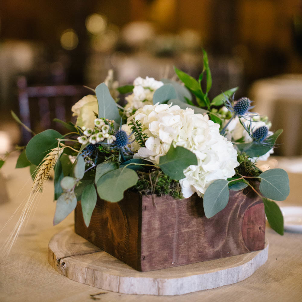 floral Centerpieces in wood boxes, reception detail photos at spruce mountain ranch, denver wedding planning, colorado wedding planner, destination wedding planner, sweetly paired weddings